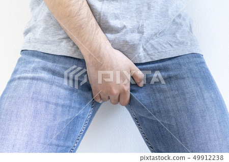 Men holding crotch 49912238
