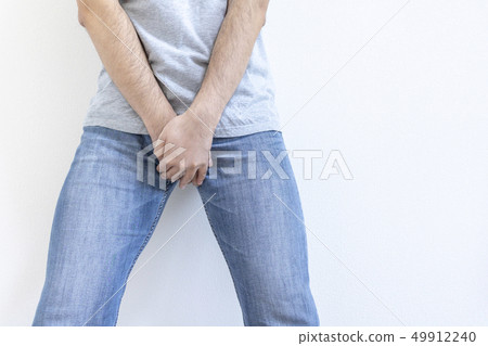 Men holding crotch 49912240