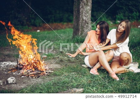 Two pretty girls in a summer park 49912714