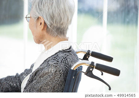 Elderly people in wheelchairs Elderly people in wheelchairs 49914565