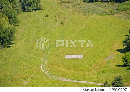 Helipad in the middle of the lawn. Helipad in the middle of the lawn. 49916397