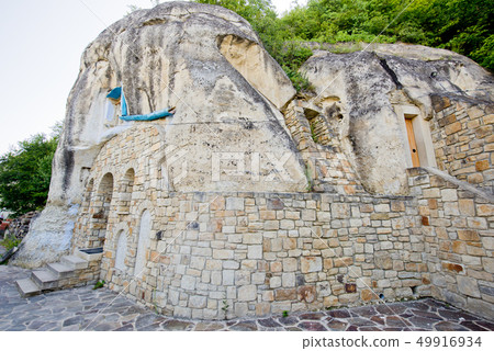 Old building in the rock. Old building in the rock. 49916934