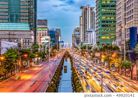 Modern city buildings on a street with evening 49920141