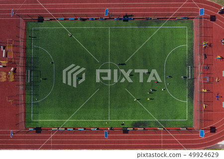 Street sports field with a football field. Shooting from the drone from above Street sports field with a football field. Shooting from the drone from above 49924629