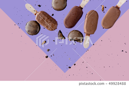 Chocolate ice lolly and french macrons on pink and purple background 49928488