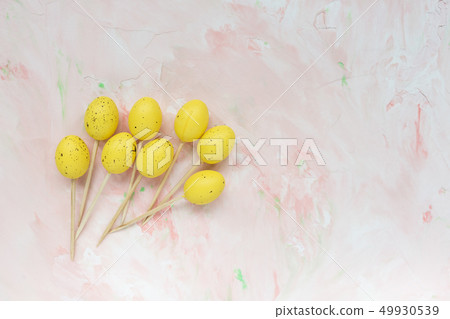 Easter sticks for appetizers on a pink background. Easter sticks for appetizers on a pink background. 49930539