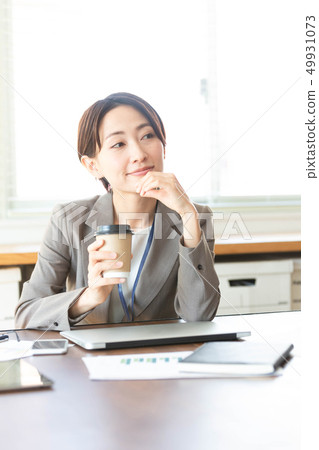 Businesswoman cell phone break image 49931073
