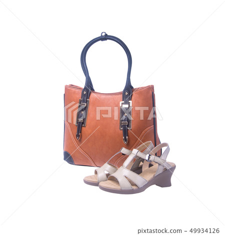 bag or women shoes and handbag on background. 49934126