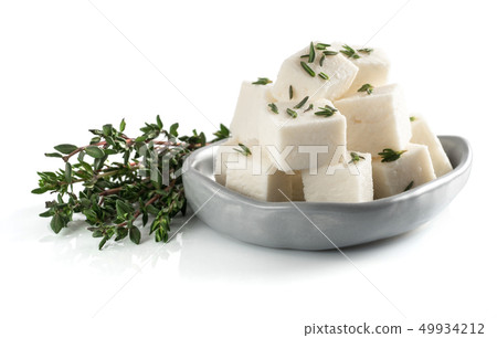 diced soft cheese isolated 49934212