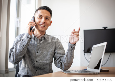 Smartphone Young man Smartphone Young man 49935200