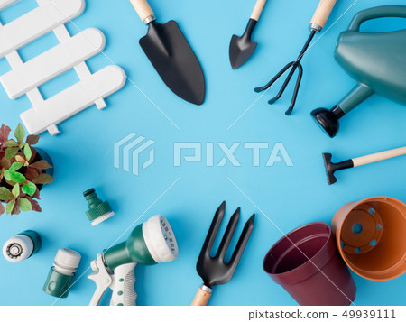 top view of garden concept with Gardening tools. top view of garden concept with Gardening tools. 49939111