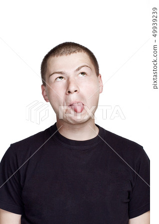Portrait of young man. Facial expression. Face Portrait of young man. Facial expression. Face 49939239