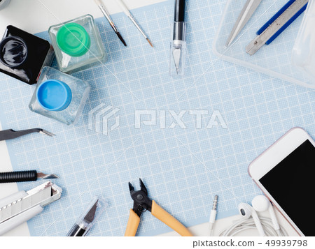 top view of hobbies concept with cutting mat. 49939798