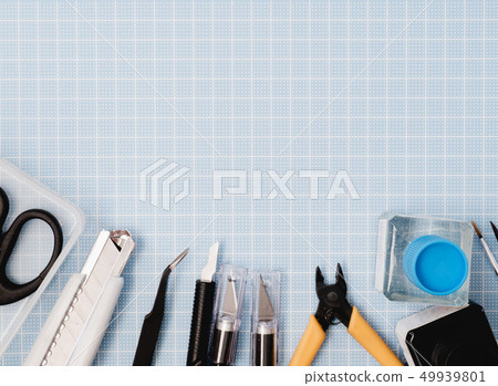 top view of hobbies concept with cutting mat. top view of hobbies concept with cutting mat. 49939801