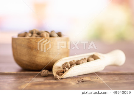 Clay pebbles (leca) with books on window Clay pebbles (leca) with books on window 49940099