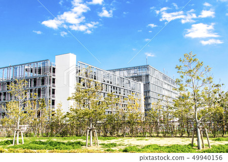 Facility with multi-level parking lot Facility with multi-level parking lot 49940156