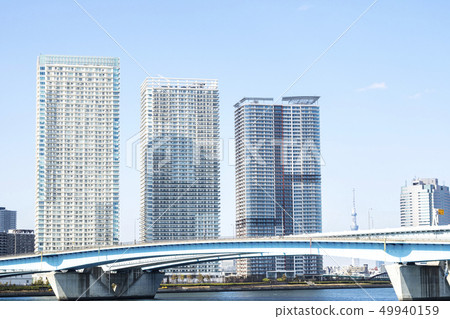 Urban landscape of the waterside with a tower apartment 49940159