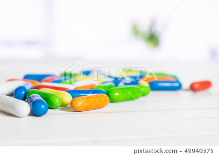Licorice sweet comfit with red tulips Licorice sweet comfit with red tulips 49940375