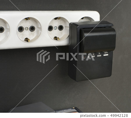 extension cord, charger and battery from the 49942128