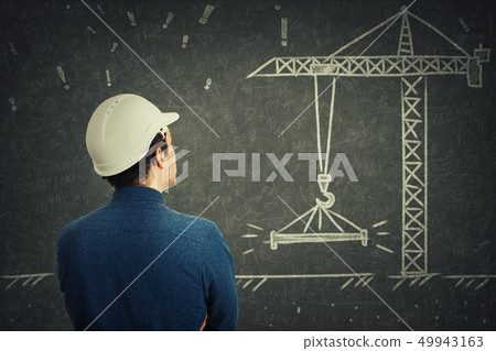 engineer in front of blackboard engineer in front of blackboard 49943163