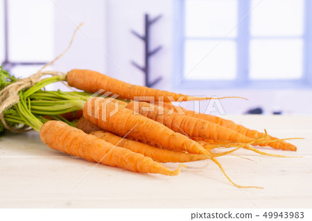 Fresh orange carrot with blue window 49943983