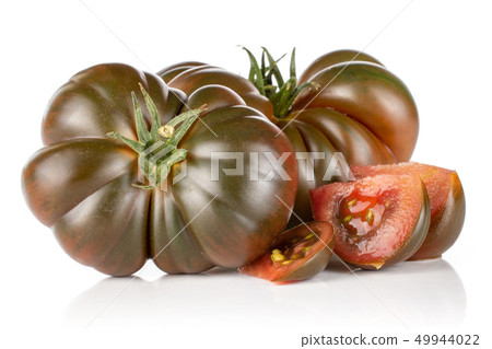 Fresh dark tomato primora isolated on white Fresh dark tomato primora isolated on white 49944022