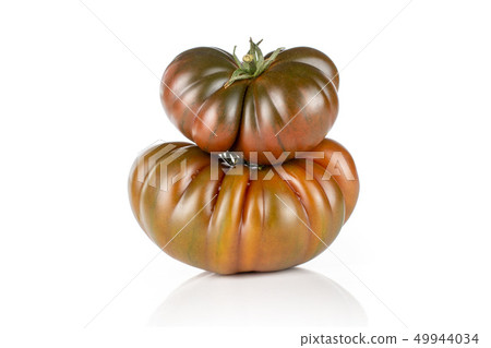 Fresh dark tomato primora isolated on white Fresh dark tomato primora isolated on white 49944034