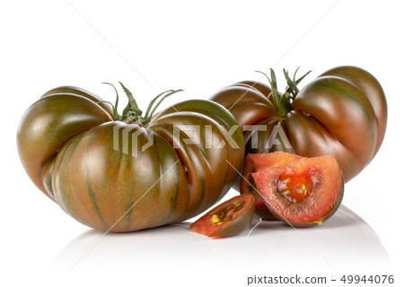 Fresh dark tomato primora isolated on white Fresh dark tomato primora isolated on white 49944076