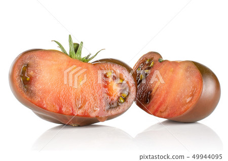 Fresh dark tomato primora isolated on white Fresh dark tomato primora isolated on white 49944095