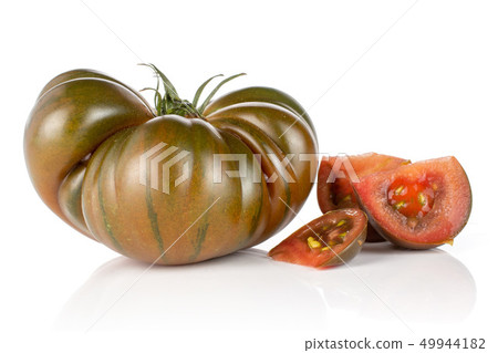 Fresh dark tomato primora isolated on white Fresh dark tomato primora isolated on white 49944182