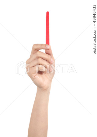 Vertical view of a woman holding a nail file Vertical view of a woman holding a nail file 49946432
