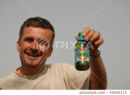 man and beer 49948115