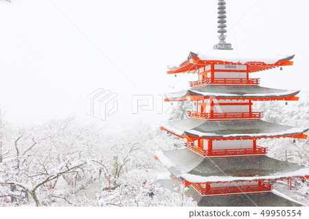 Snowy landscape of the Shinkurayama Asama park five-story pagoda 49950554
