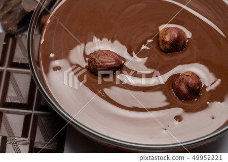 glass bowl of chocolate cream or melted chocolate isolated on white glass bowl of chocolate cream or melted chocolate isolated on white 49952221