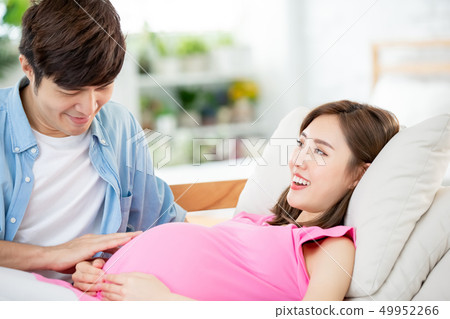 pregnant woman with her husband pregnant woman with her husband 49952266
