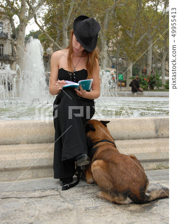 reading woman and fountain reading woman and fountain 49955413