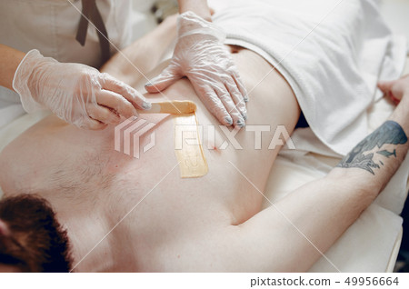 Handsome man in a beauty salon 49956664