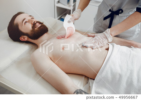 Handsome man in a beauty salon Handsome man in a beauty salon 49956667