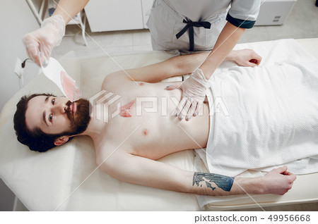 Handsome man in a beauty salon Handsome man in a beauty salon 49956668
