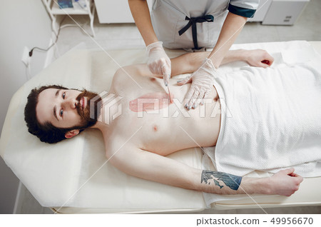 Handsome man in a beauty salon Handsome man in a beauty salon 49956670
