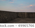 Breakwater at dusk 49965766