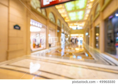 Abstract blur and defocused shopping mall of department store Abstract blur and defocused shopping mall of department store 49968880