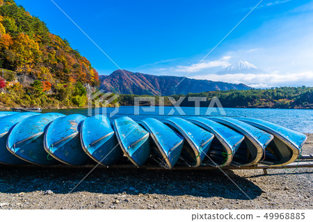 Beautiful landscape of mountain fuji with maple leaf tree around lake Beautiful landscape of mountain fuji with maple leaf tree around lake 49968885