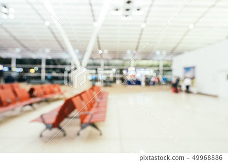 Abstract blur and defocused airport terminal interior Abstract blur and defocused airport terminal interior 49968886