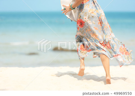 Close up legs smiling lifestyle woman wearing Close up legs smiling lifestyle woman wearing 49969550