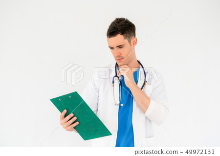 Confident doctor in uniform on white background. 49972131