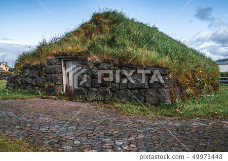 Ancient turf house in Iceland. Ancient turf house in Iceland. 49973448