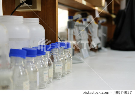 glass bottle in scientific lab. laboratory glassware. glass bottle in scientific lab. laboratory glassware. 49974937