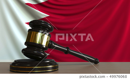 Judge's gavel and block against the flag of Bahrain. Bahraini court conceptual 3D rendering Judge's gavel and block against the flag of Bahrain. Bahraini court conceptual 3D rendering 49976068