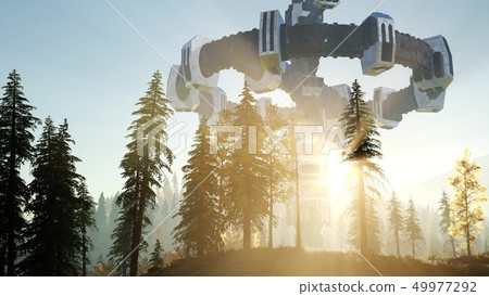 UFO hovering over a forest at sunset with light 49977292